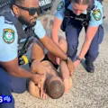 A former NRL player has gone on a bizarre rampage through Brookvale, sporting only his underpants as he jumped on several moving cars.